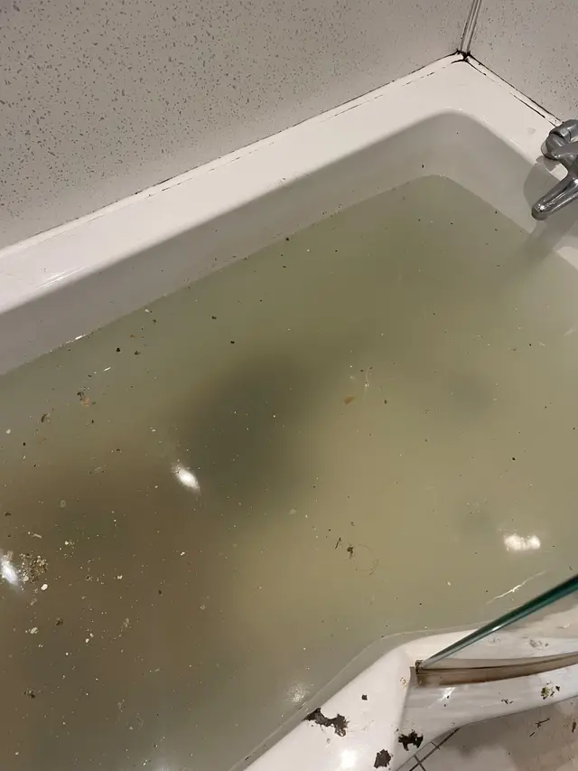 Bath full of dirty standing water